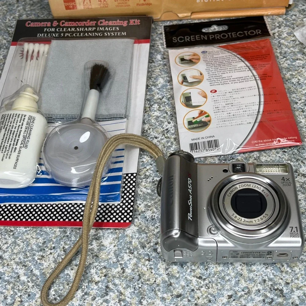 Canon PowerShot A570 IS Digital Camera 7.1MP Silver 4x Zoom Bundle Boxed Tested